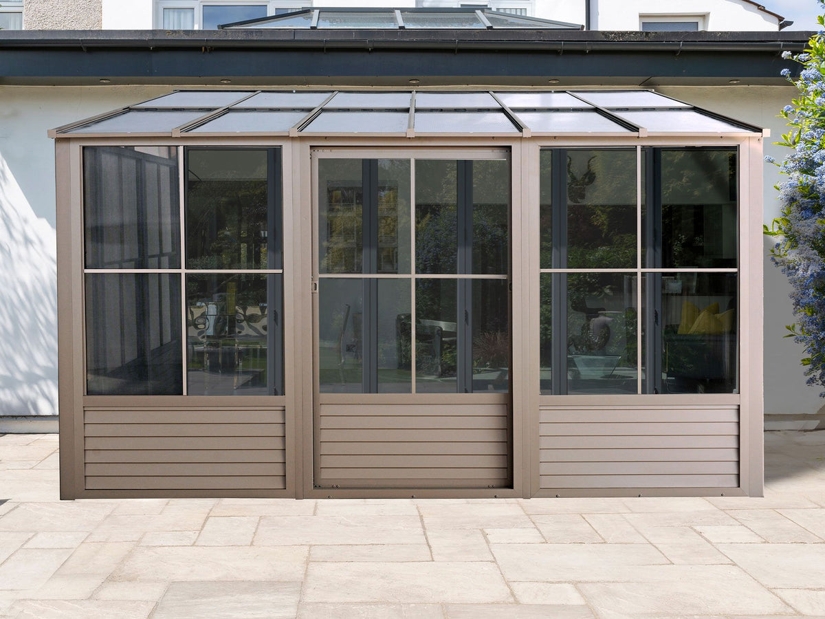 Florence 10x12 ft. Wall–Mounted Solarium, Polycarbonate Roof, Sand